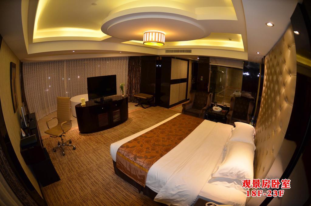 Wanjia International Hotel Csüancsou Szoba fotó