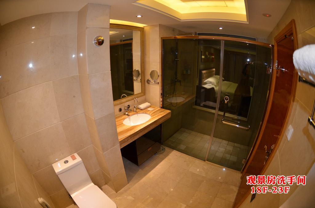 Wanjia International Hotel Csüancsou Szoba fotó