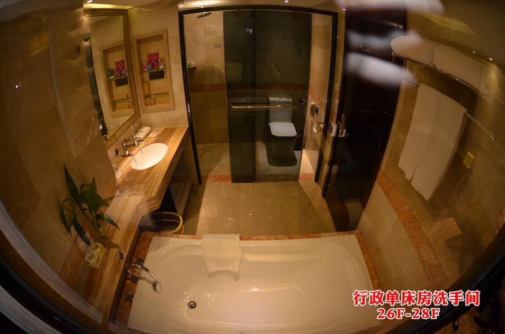 Wanjia International Hotel Csüancsou Szoba fotó