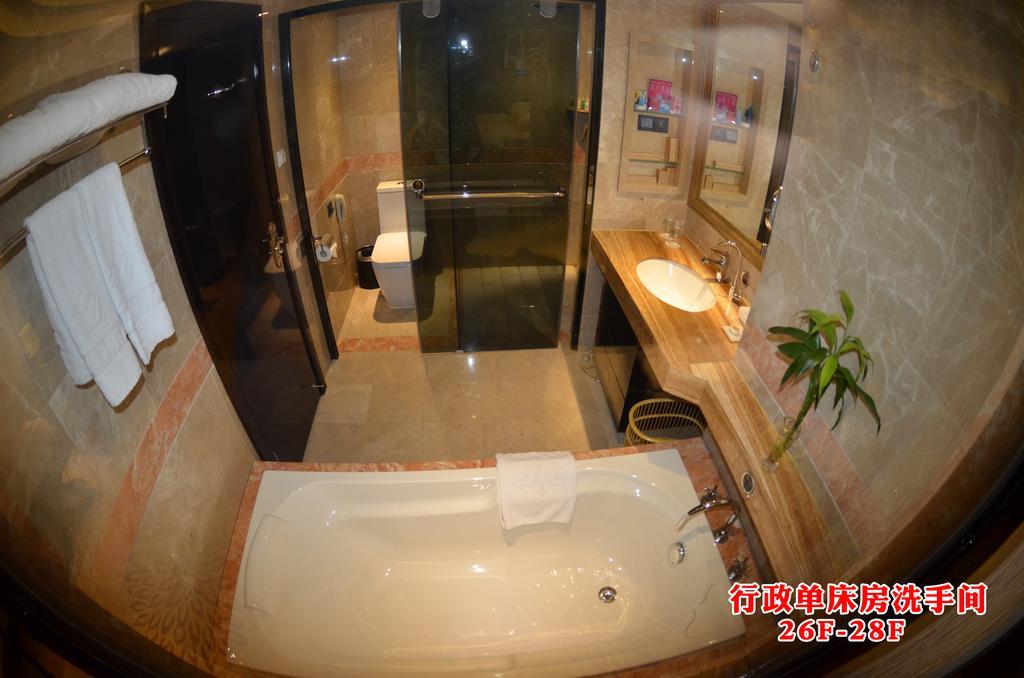 Wanjia International Hotel Csüancsou Szoba fotó