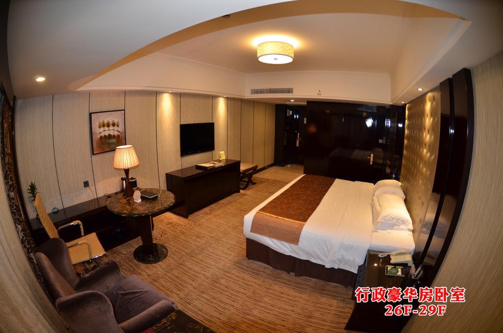 Wanjia International Hotel Csüancsou Szoba fotó