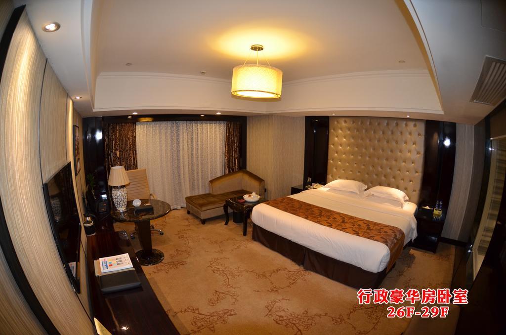 Wanjia International Hotel Csüancsou Szoba fotó