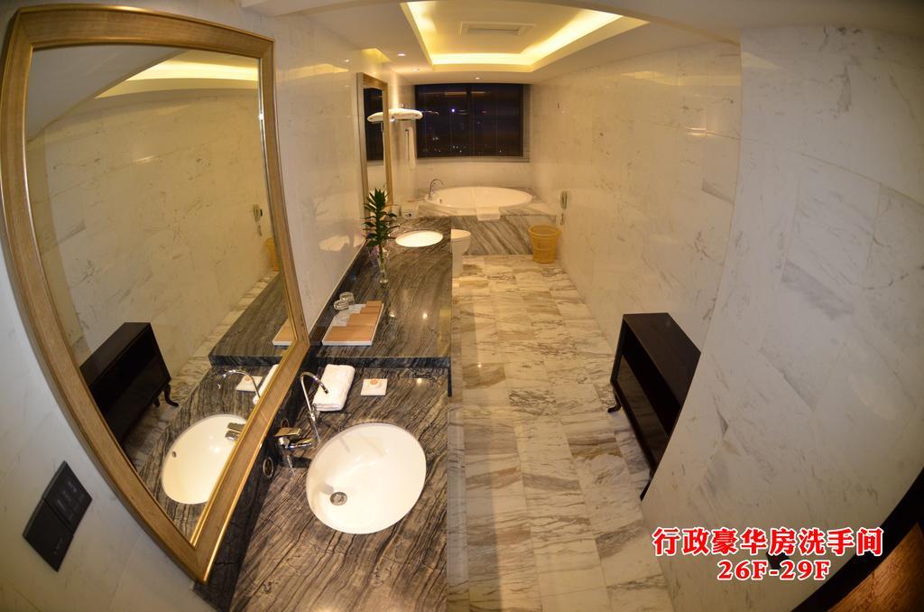 Wanjia International Hotel Csüancsou Szoba fotó