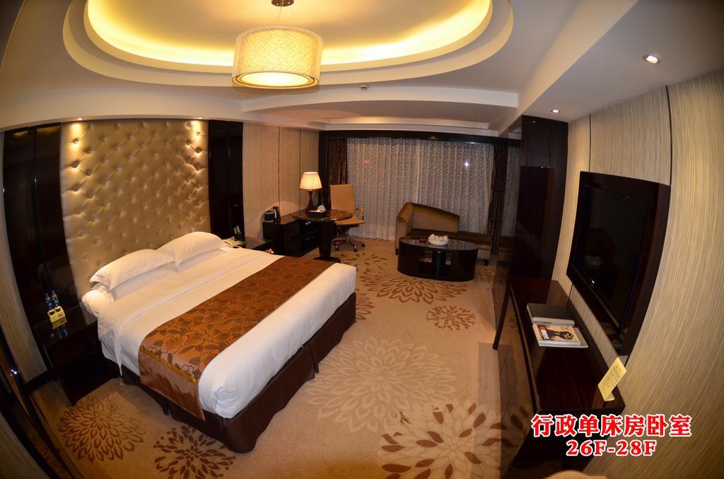 Wanjia International Hotel Csüancsou Szoba fotó
