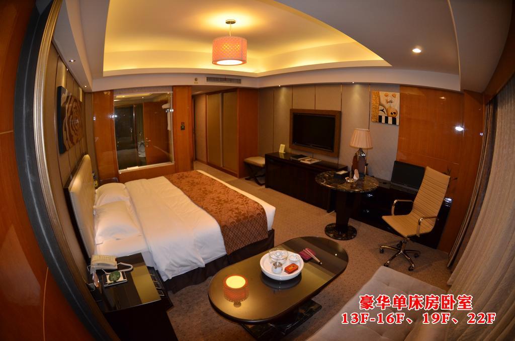Wanjia International Hotel Csüancsou Szoba fotó
