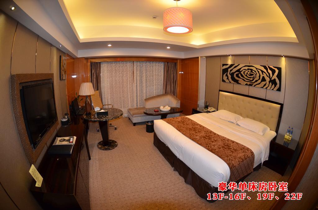 Wanjia International Hotel Csüancsou Szoba fotó