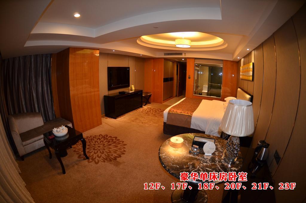 Wanjia International Hotel Csüancsou Szoba fotó