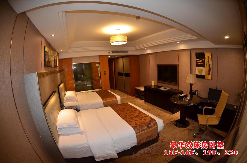 Wanjia International Hotel Csüancsou Szoba fotó