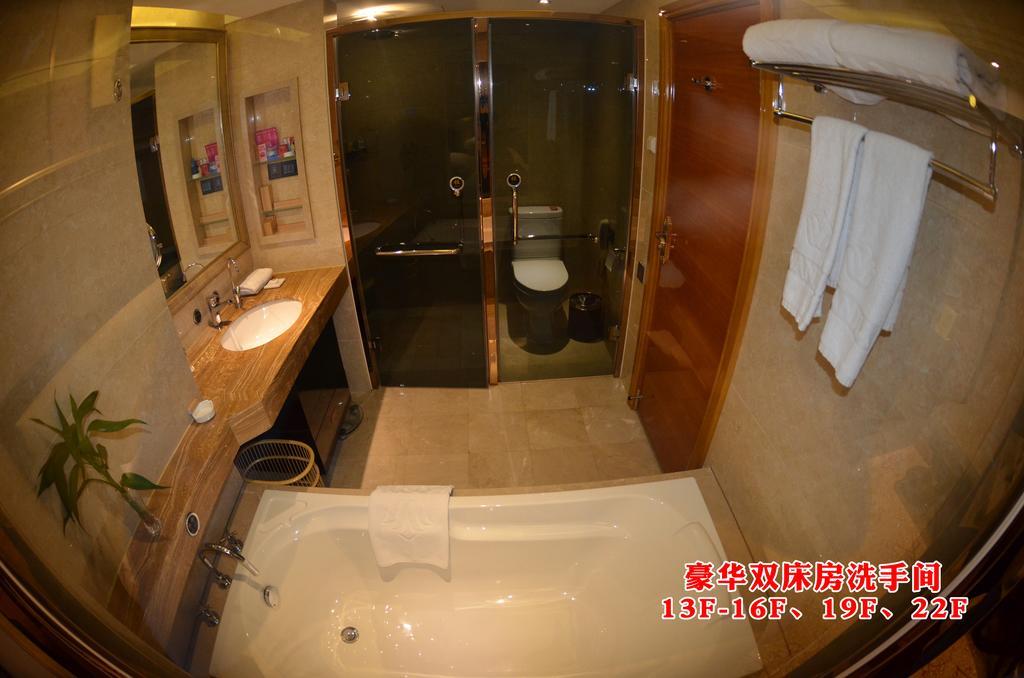 Wanjia International Hotel Csüancsou Szoba fotó