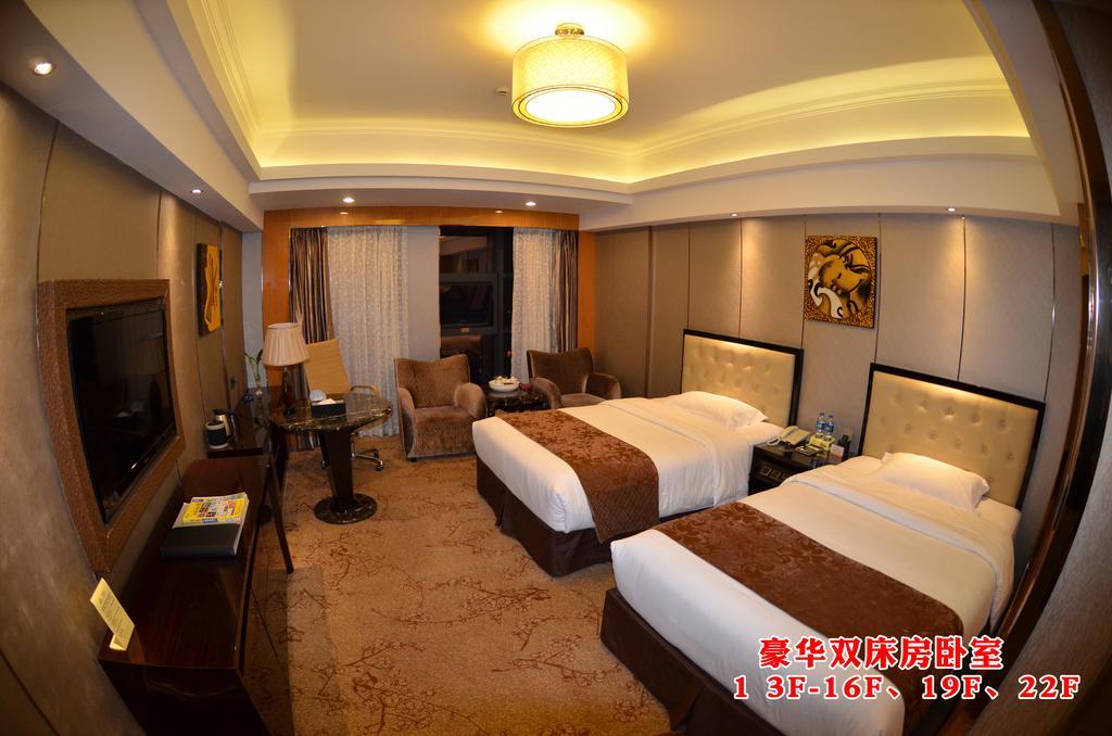 Wanjia International Hotel Csüancsou Szoba fotó