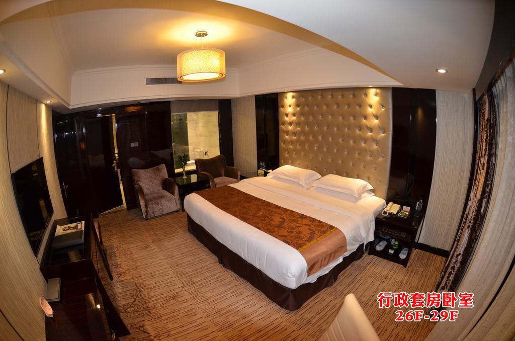 Wanjia International Hotel Csüancsou Szoba fotó
