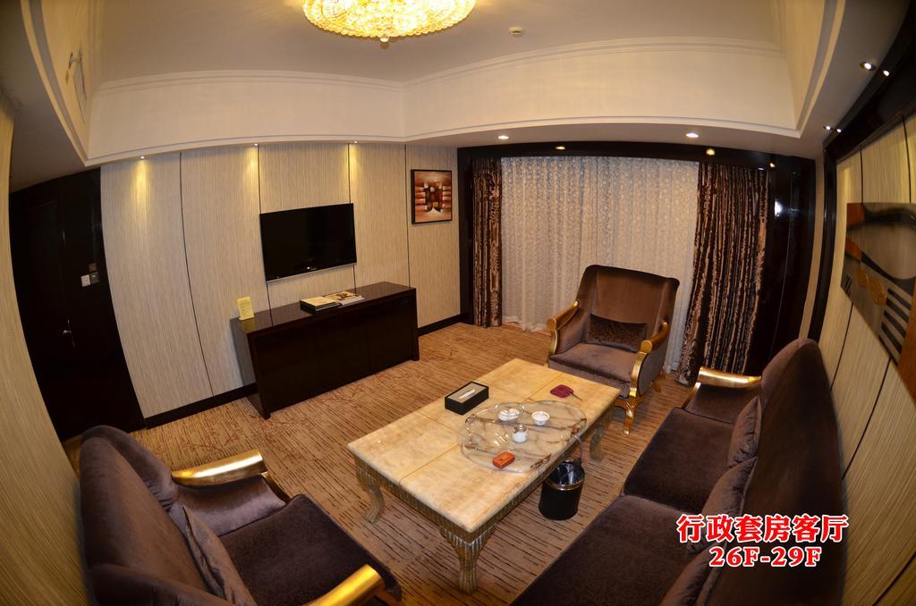 Wanjia International Hotel Csüancsou Szoba fotó