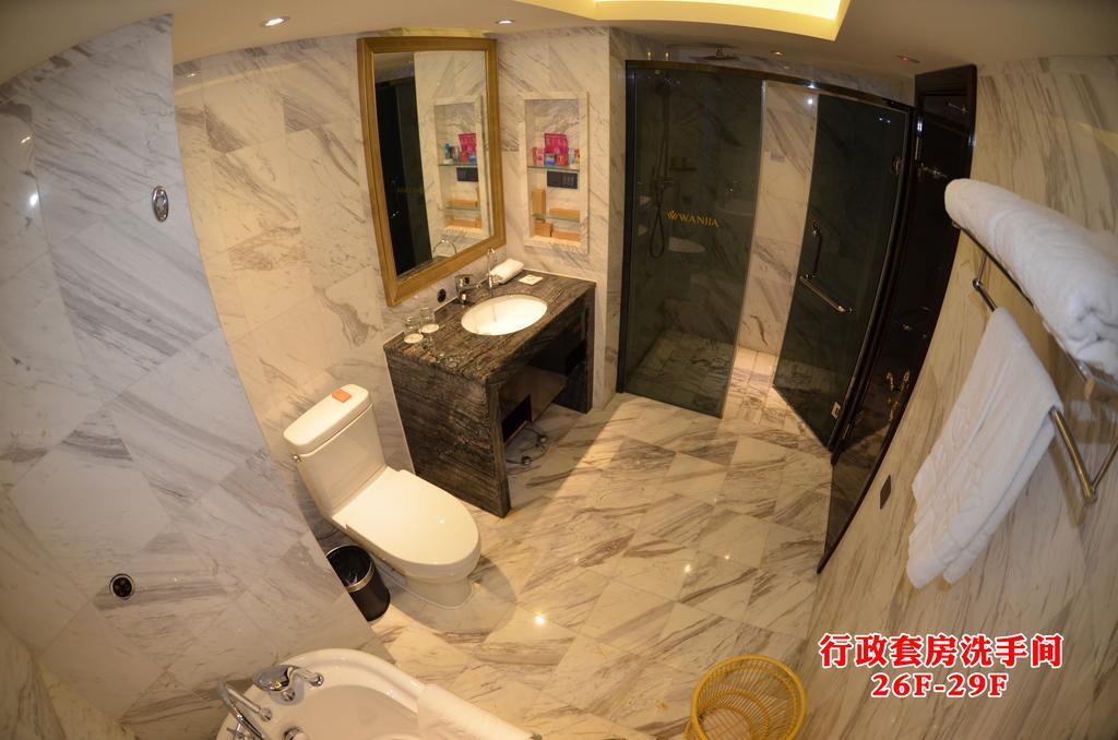 Wanjia International Hotel Csüancsou Szoba fotó