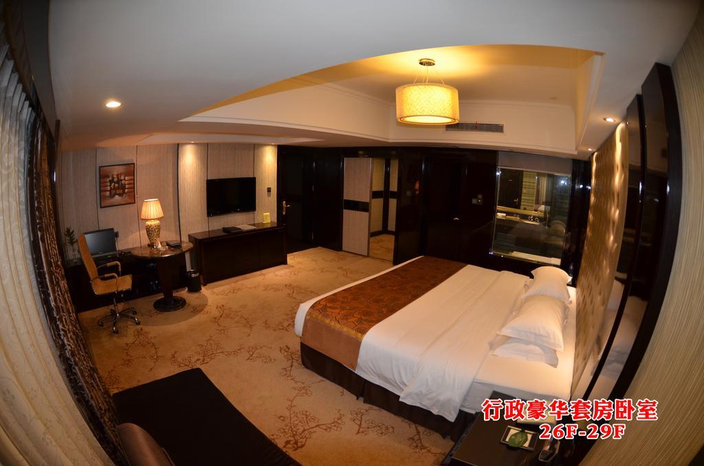 Wanjia International Hotel Csüancsou Szoba fotó