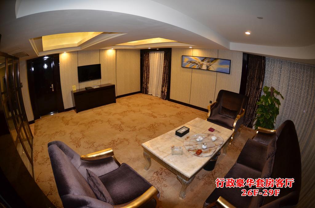 Wanjia International Hotel Csüancsou Szoba fotó