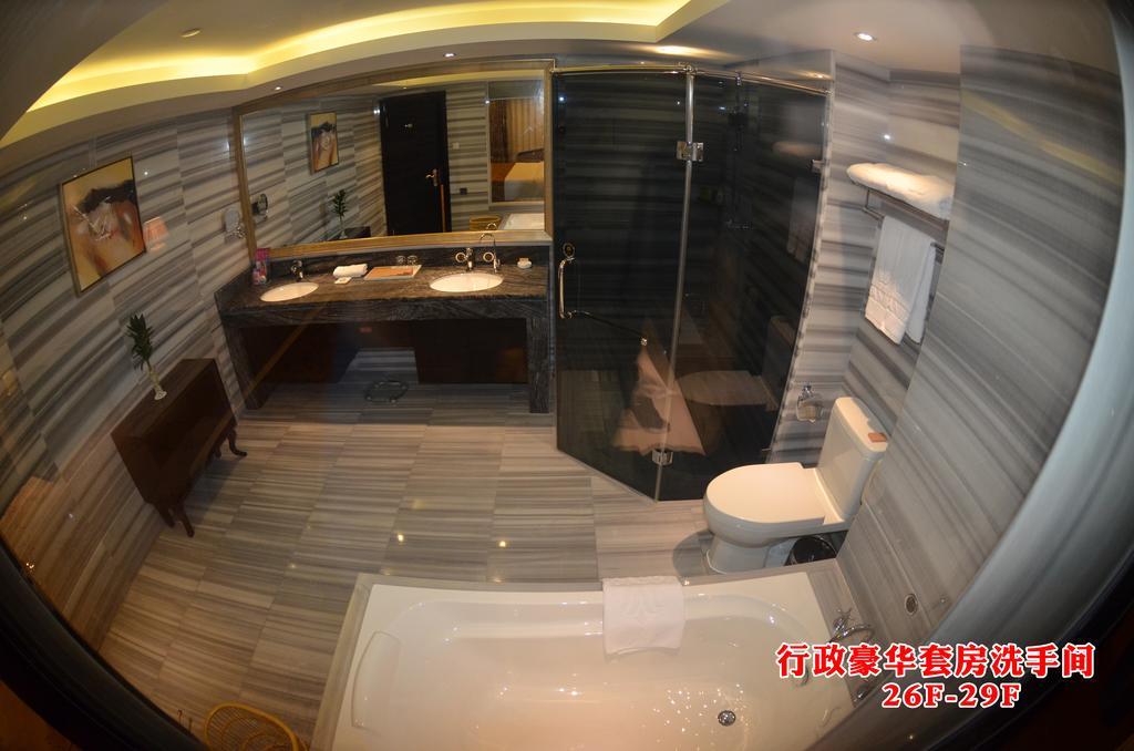 Wanjia International Hotel Csüancsou Szoba fotó