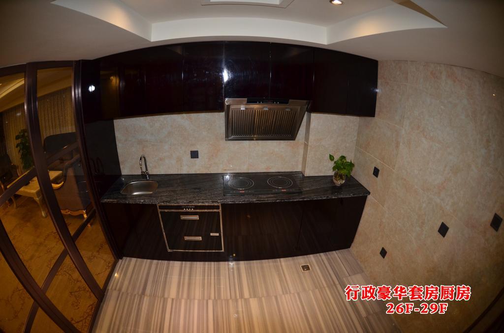 Wanjia International Hotel Csüancsou Szoba fotó