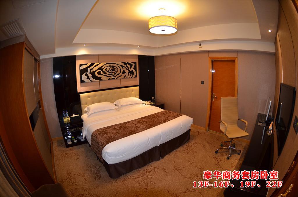 Wanjia International Hotel Csüancsou Szoba fotó