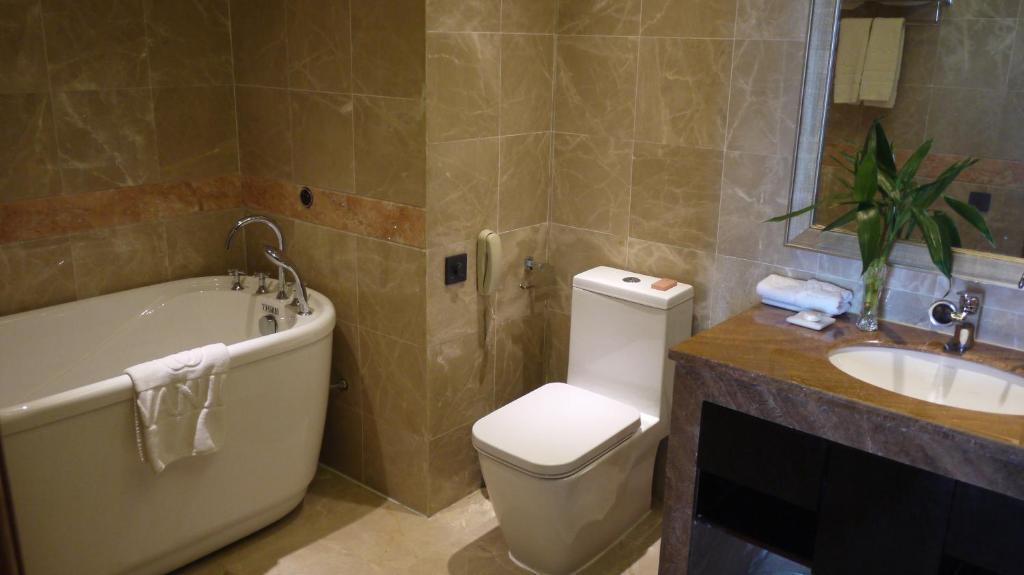 Wanjia International Hotel Csüancsou Szoba fotó