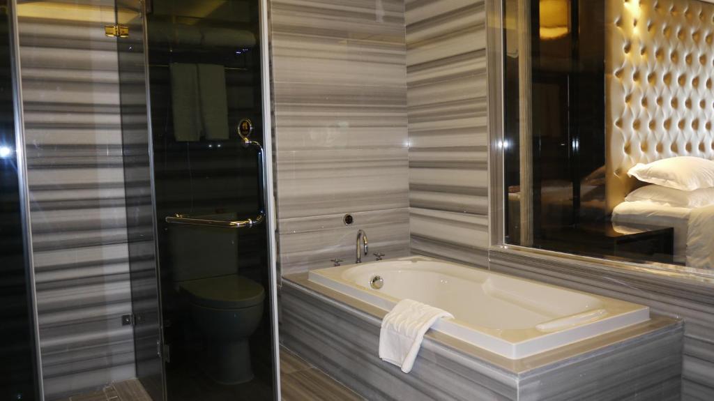 Wanjia International Hotel Csüancsou Szoba fotó